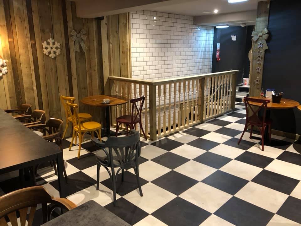 Karndean Opus Vinyl Flooring fitted in Newton Abbot Restaurant in a black and white checkerboard effect