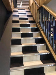 Karndean Opus Vinyl Flooring fitted on staircase in Newton Abbot Restaurant in a black and white checkerboard effect