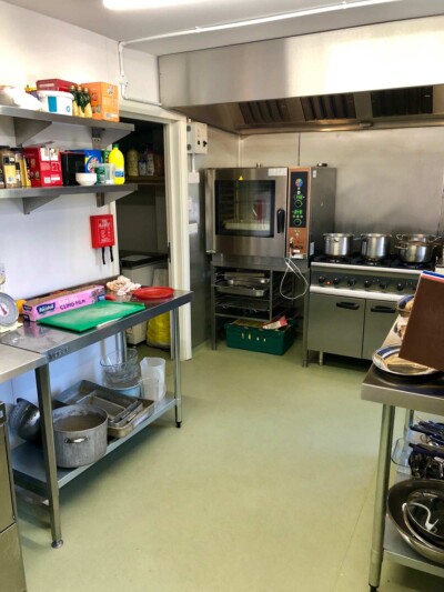 Kitchen installed with Altro safty flooring and hygienic wall cladding