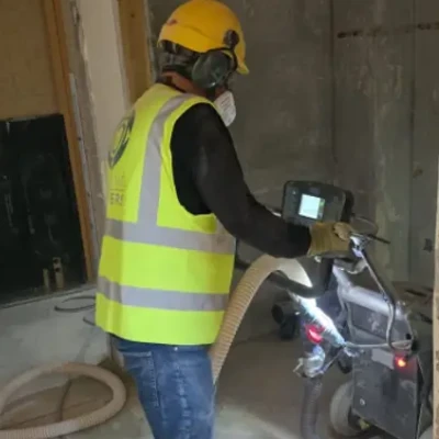 Flooring Matters Employee working on Exeter University Commercial Flooring Project